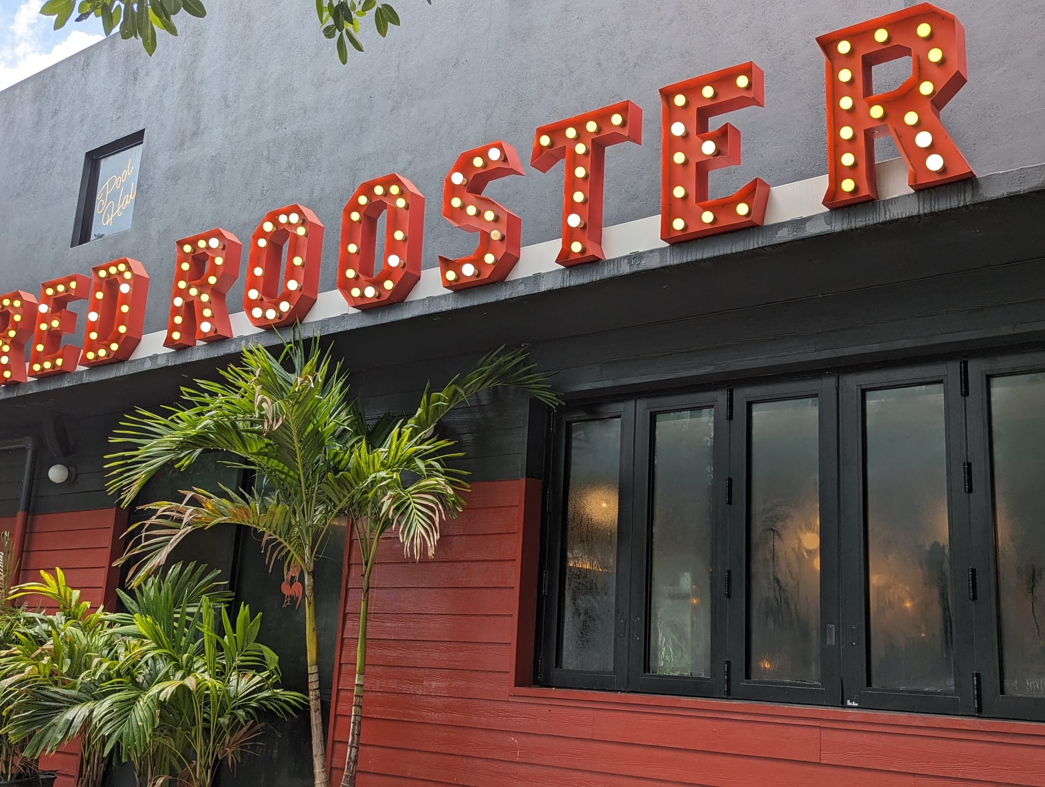 sign of red rooster overtown